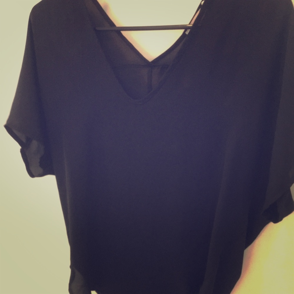 Junior’s sheer black v-neck tee